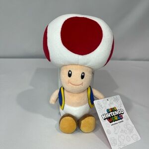 Super Mario World Toad Plush 

Measures 8” Tall